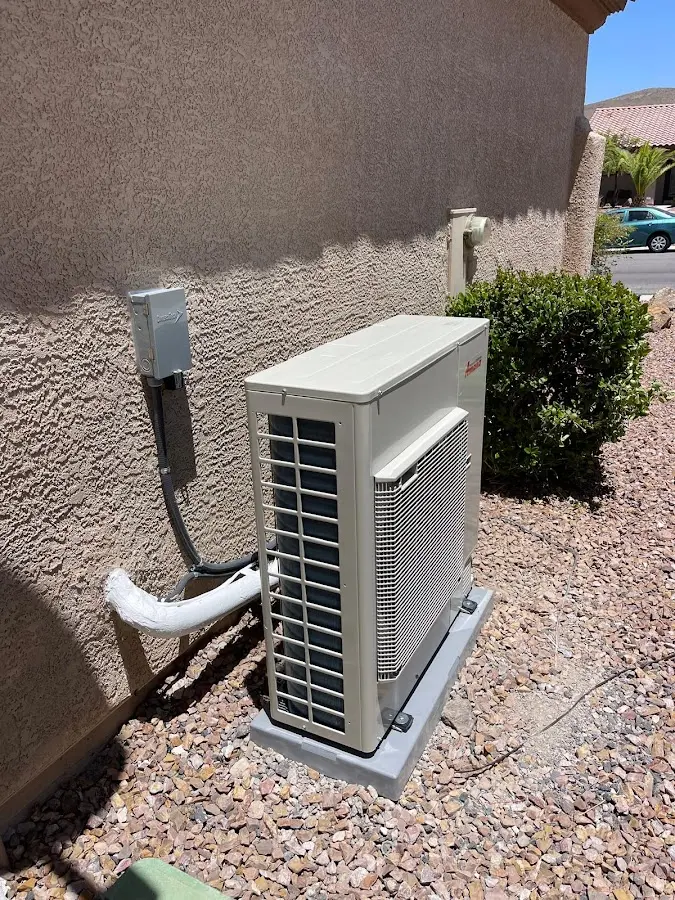 Residential air conditioning condenser unit in Kirtland